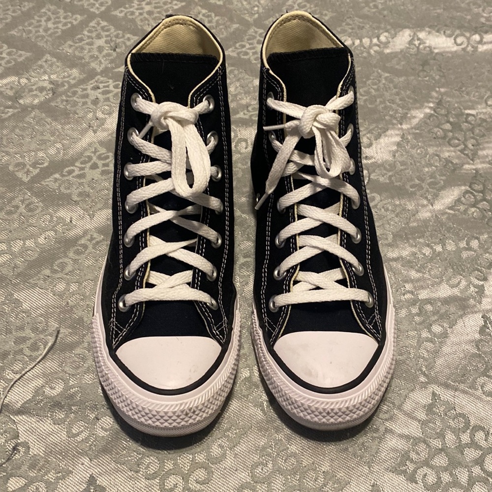 Black and white high top all star converse